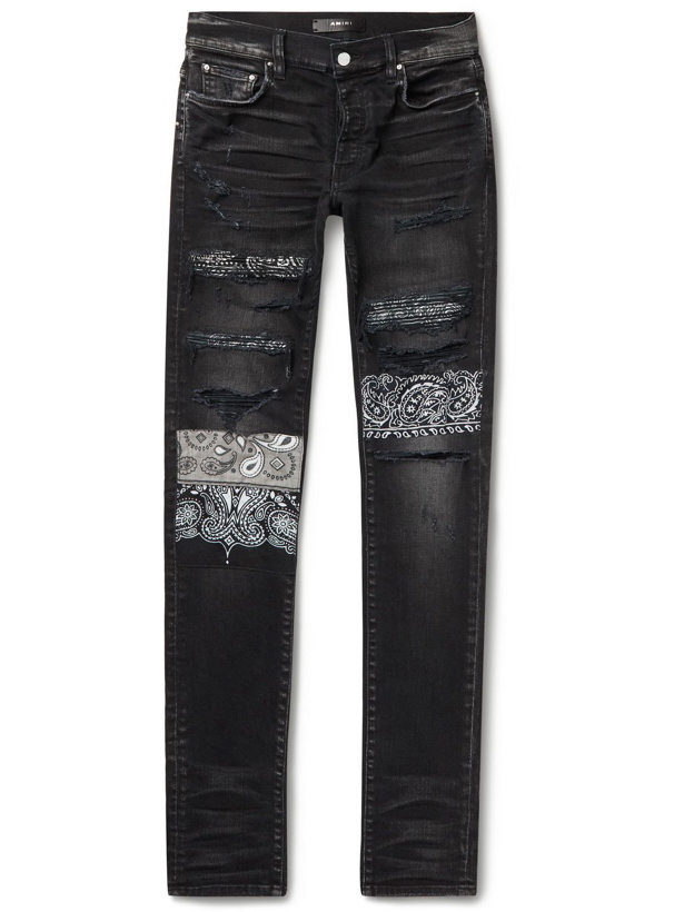 Photo: AMIRI - Skinny-Fit Appliquéd Panelled Distressed Jeans - Black