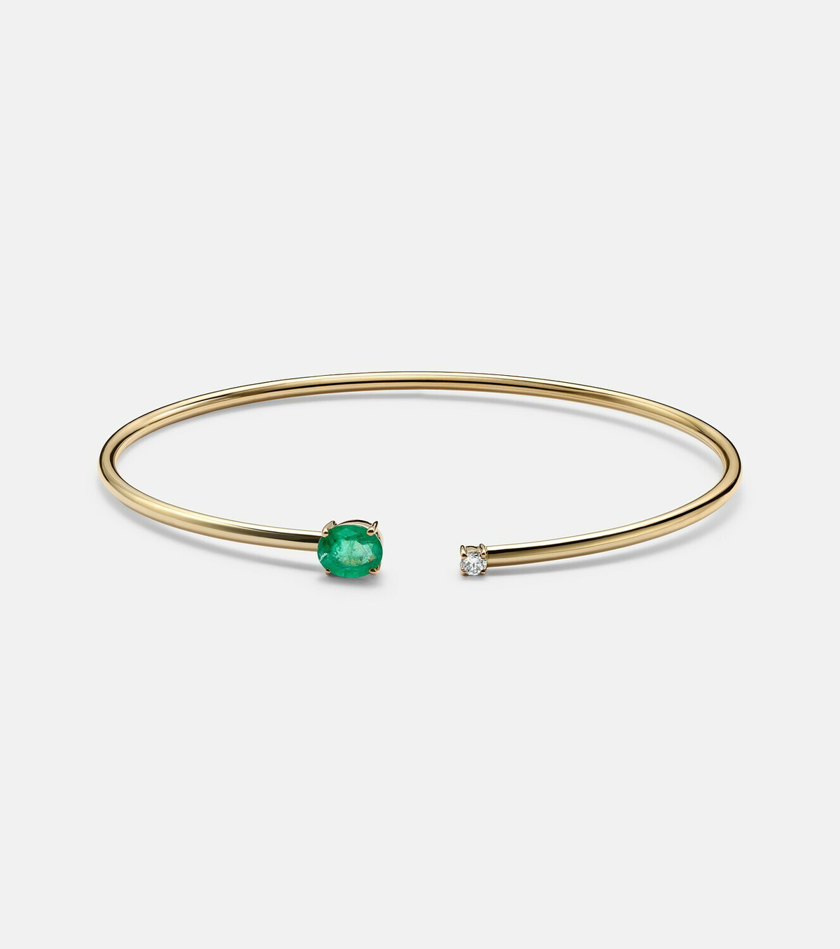Stone and Strand 14kt gold (585/1000) cuff bracelet with emeralds and diamonds