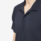 Homme Plissé Issey Miyake Men's Pleated Polo Shirt in Navy