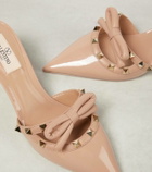 Valentino Garavani Rockstud bow-detail patent leather mules