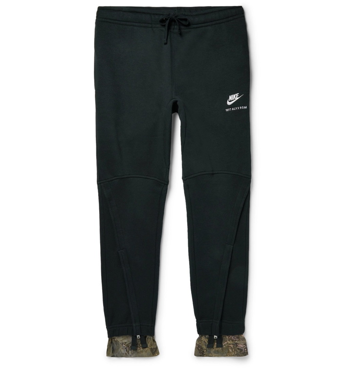 Photo: 1017 ALYX 9SM - Nike Tapered Camouflage-Print Trimmed Fleece-Back Cotton-Blend Jersey Sweatpants - Black