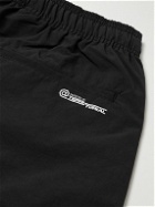 WTAPS - Logo-Print Tapered Nylon Drawstring Trousers - Black