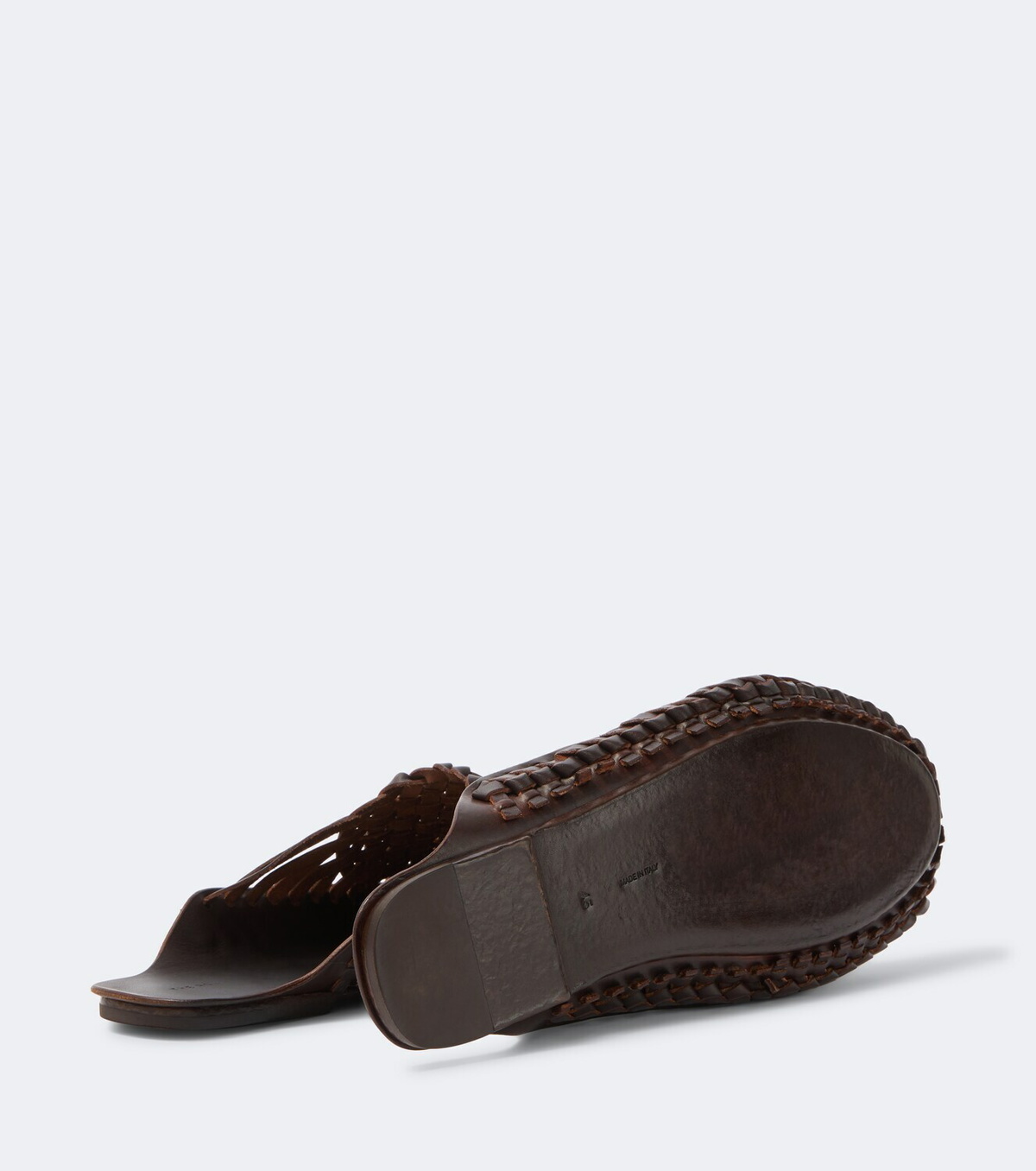 The Row Woven leather slip-on shoes