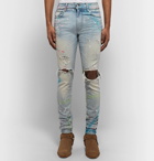 AMIRI - Skinny-Fit Distressed Paint-Splattered Stretch-Denim Jeans - Light denim
