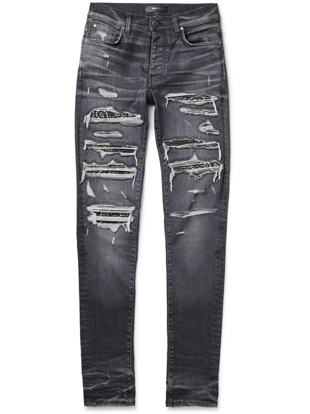 Photo: AMIRI - Thrasher Skinny-Fit Panelled Distressed Jeans - Gray