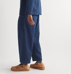 11.11/eleven eleven - Ride Wide-Leg Cropped Pleated Indigo-Dyed Cotton Trousers - Blue