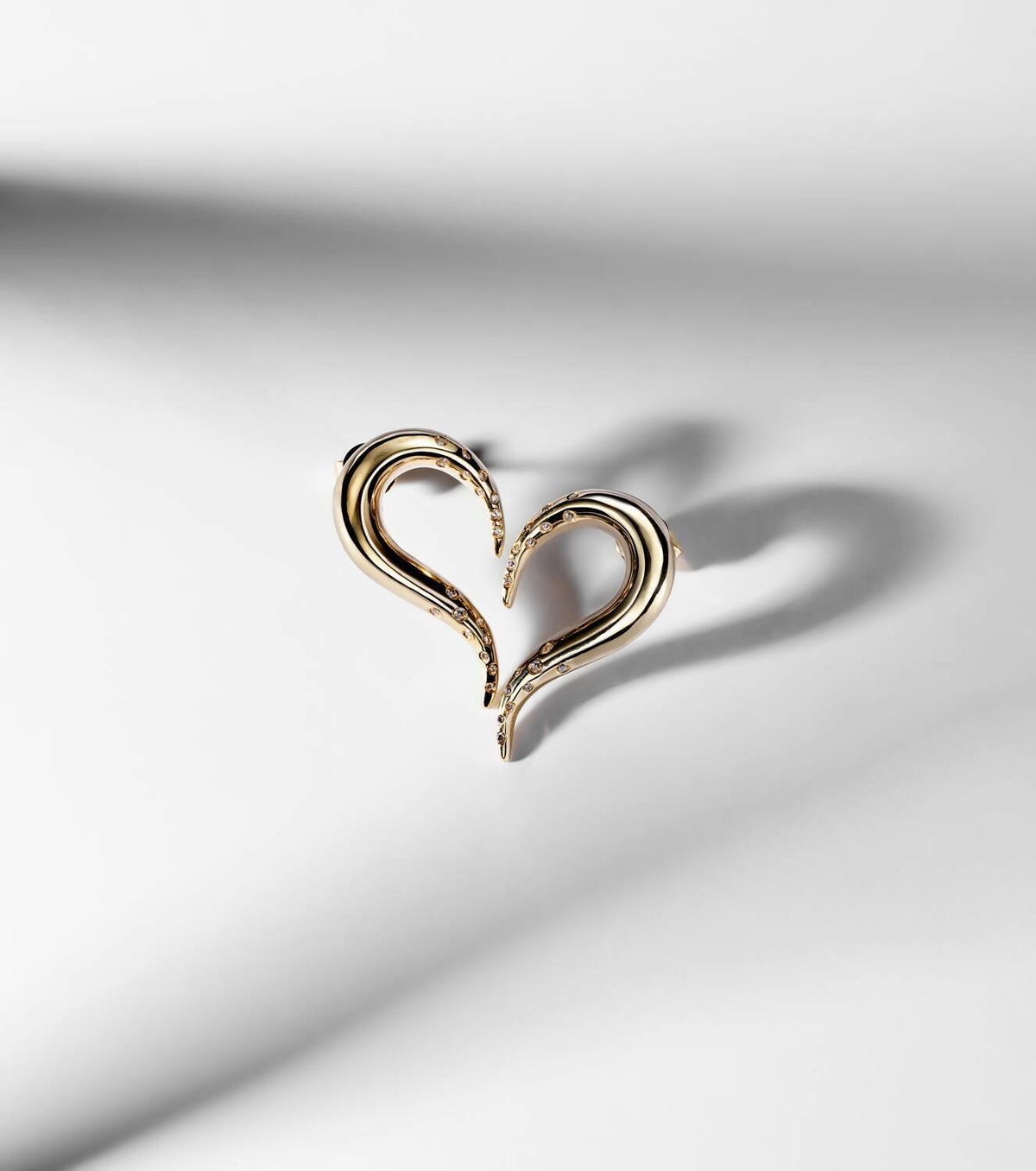 Mateo Swoosh 14kt gold earrings with diamonds