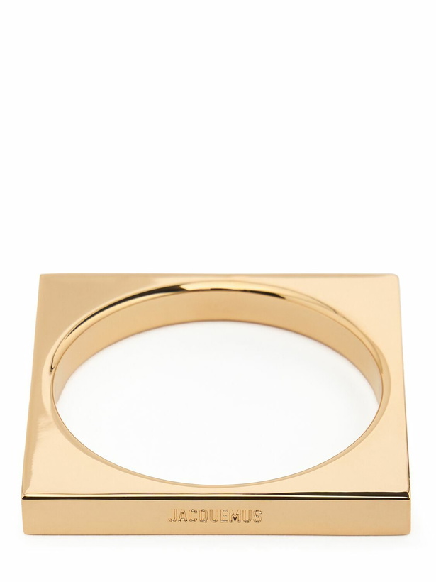 Photo: JACQUEMUS Le Bracelet Carré Bangle Bracelet