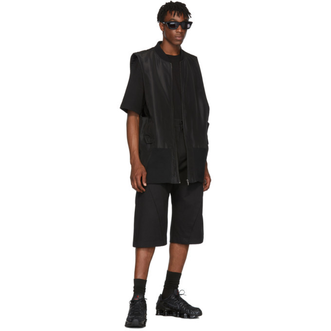 D.Gnak by Kang.D Black Raw Diagonal Cut Trousers