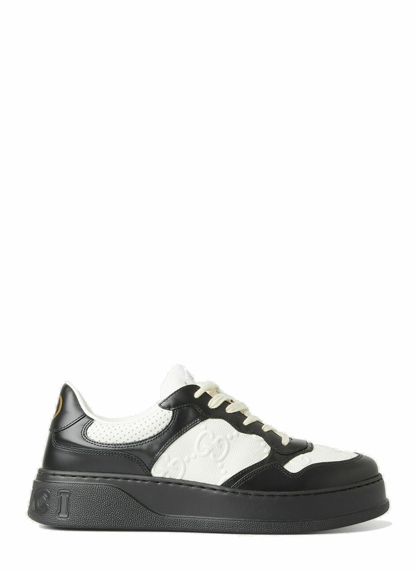 Photo: Gucci - GG Embossed Sneakers in Black