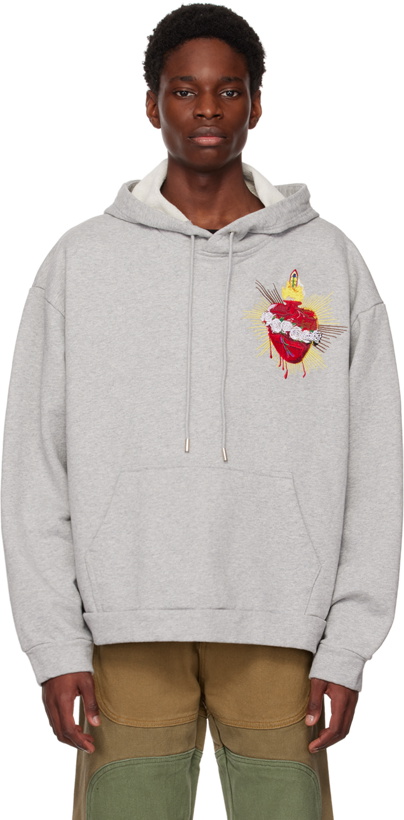 Photo: Who Decides War by MRDR BRVDO Gray Crest Sacred Heart Hoodie