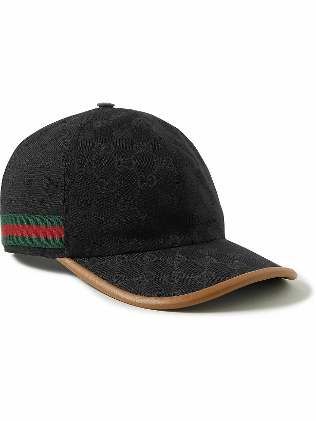 Photo: GUCCI - Leather and Webbbing-Trimmed Monogrammed Canvas Baseball Cap - Black