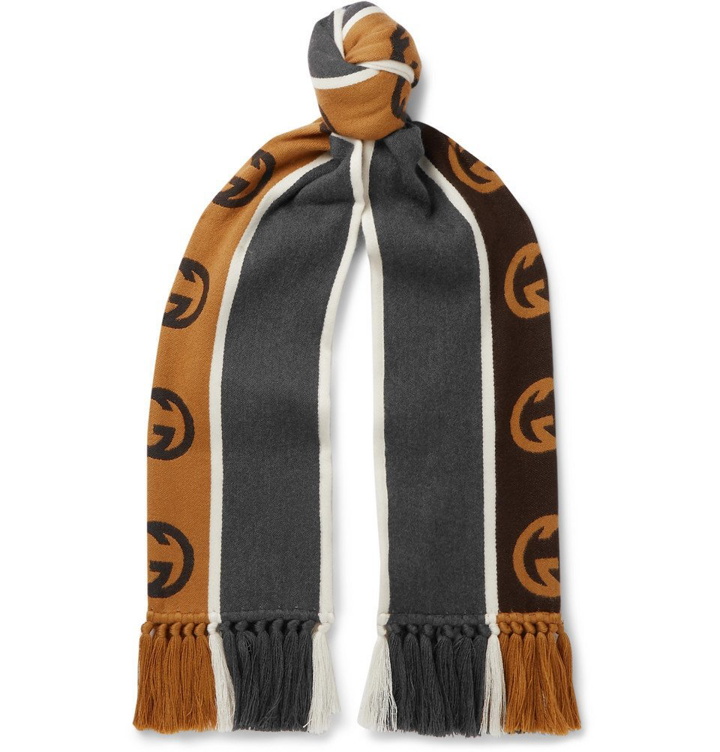 Photo: Gucci - Tasselled Striped Logo-Intarsia Wool and Cotton-Blend Scarf - Gray