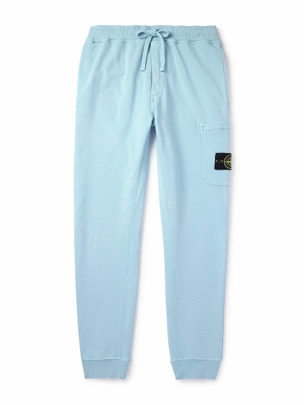 Photo: Stone Island - Tapered Logo-Appliquéd Cotton-Jersey Sweatpants - Blue