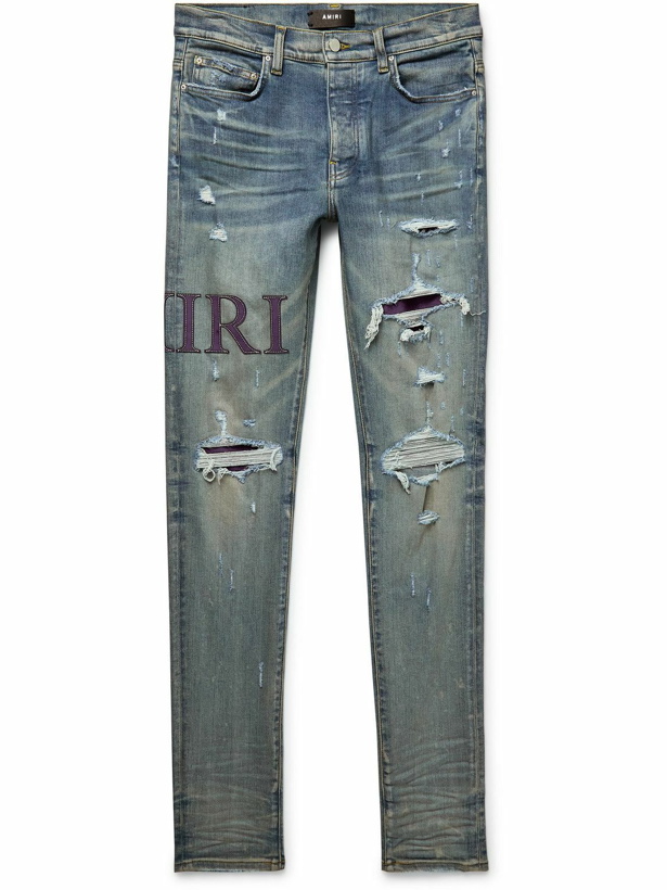 Photo: AMIRI - Skinny-Fit Logo-Appliquéd Distressed Jeans - Blue