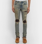 AMIRI - MX1 Skinny-Fit Rib-Panelled Distressed Stretch-Denim Jeans - Men - Blue