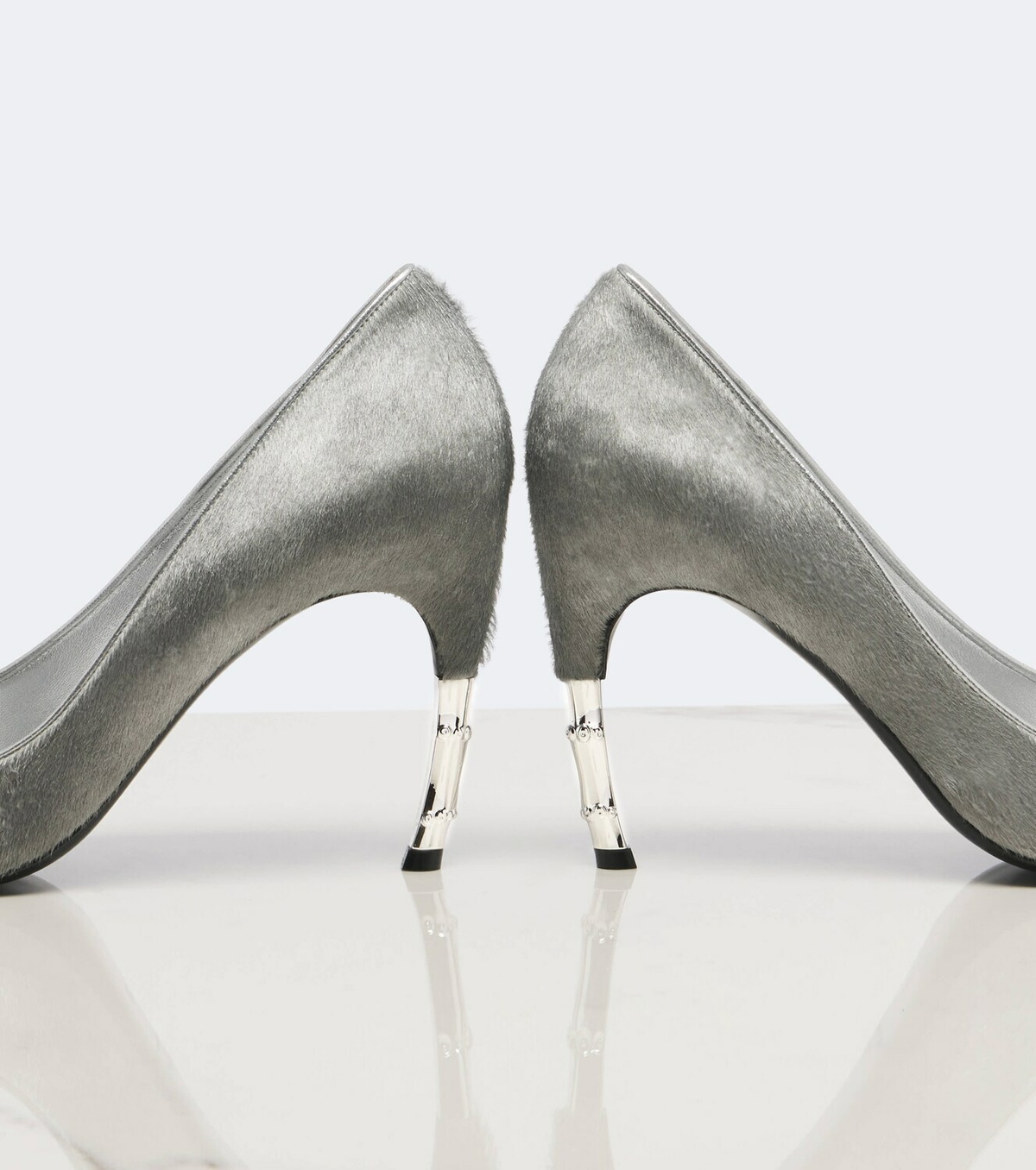 Gucci Castello calf hair pumps
