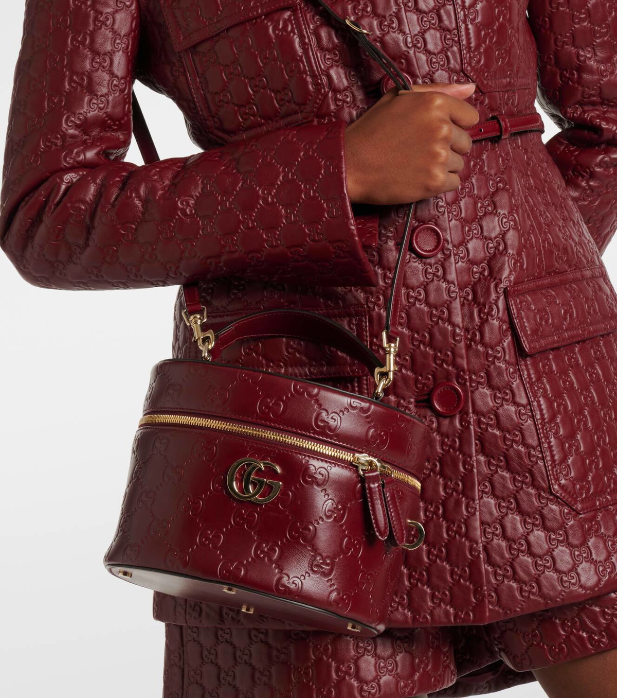 Gucci GG embossed leather vanity bag