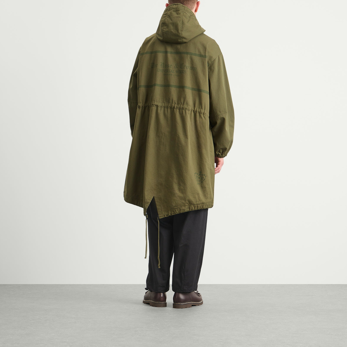 END. x Universal Works Men's Shipp Inn Parka Jacket in Light Olive