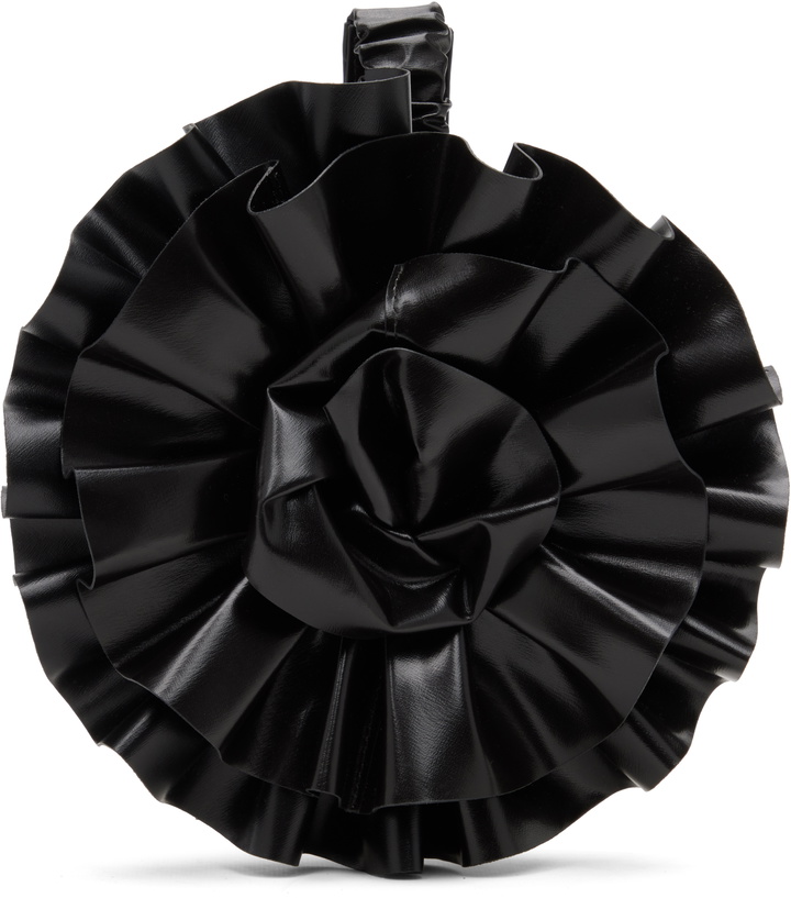 Photo: VAQUERA Black Corsage Clutch