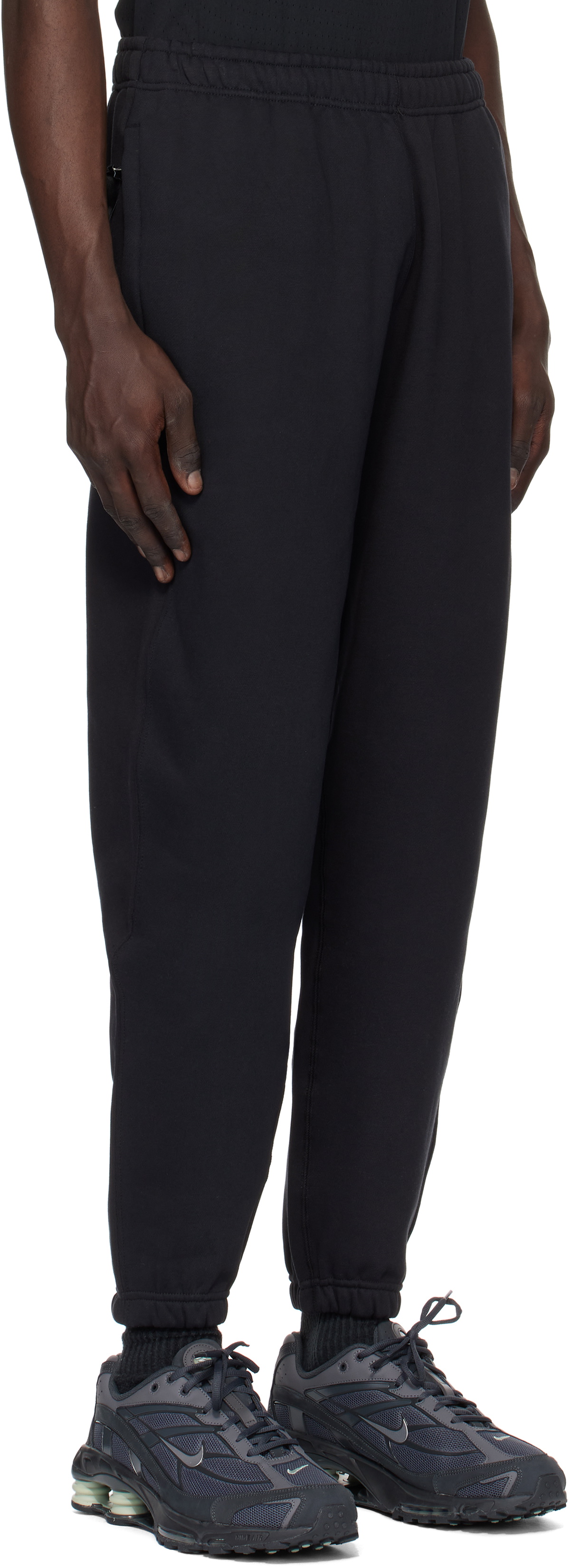 nike swoosh cuffed joggers in black