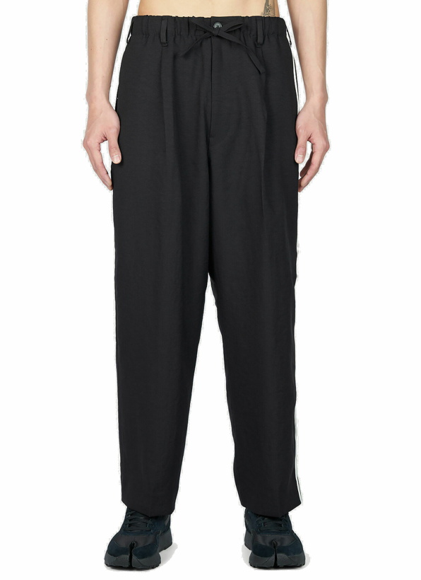 Photo: Y-3 - Striped Track Pants in Black