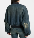 Balenciaga Distressed denim bomber jacket