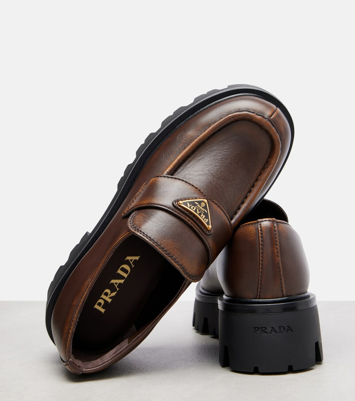 Prada Logo leather platform loafers