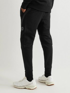 C.P. Company - Tapered Panelled Logo-Appliquéd Cotton-Jersey Sweatpants - Black