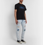 AMIRI - MX1 Skinny-Fit Panelled Distressed Stretch-Denim Jeans - Blue