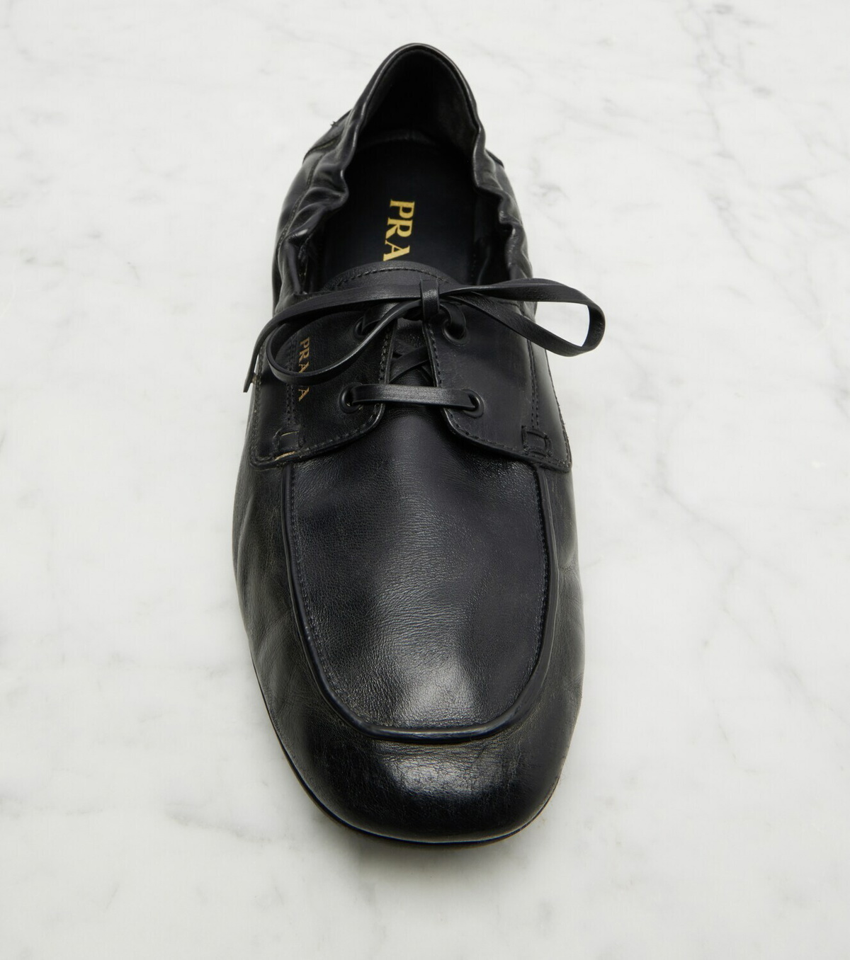 Prada Shuffle leather boat shoes