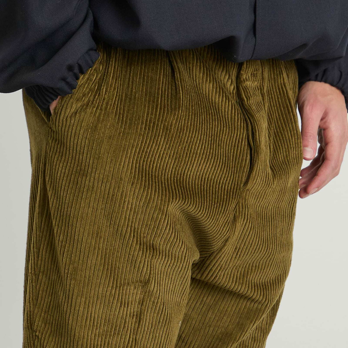AMI Paris Men's Corduroy Velvet Carrot Pants in Bronze