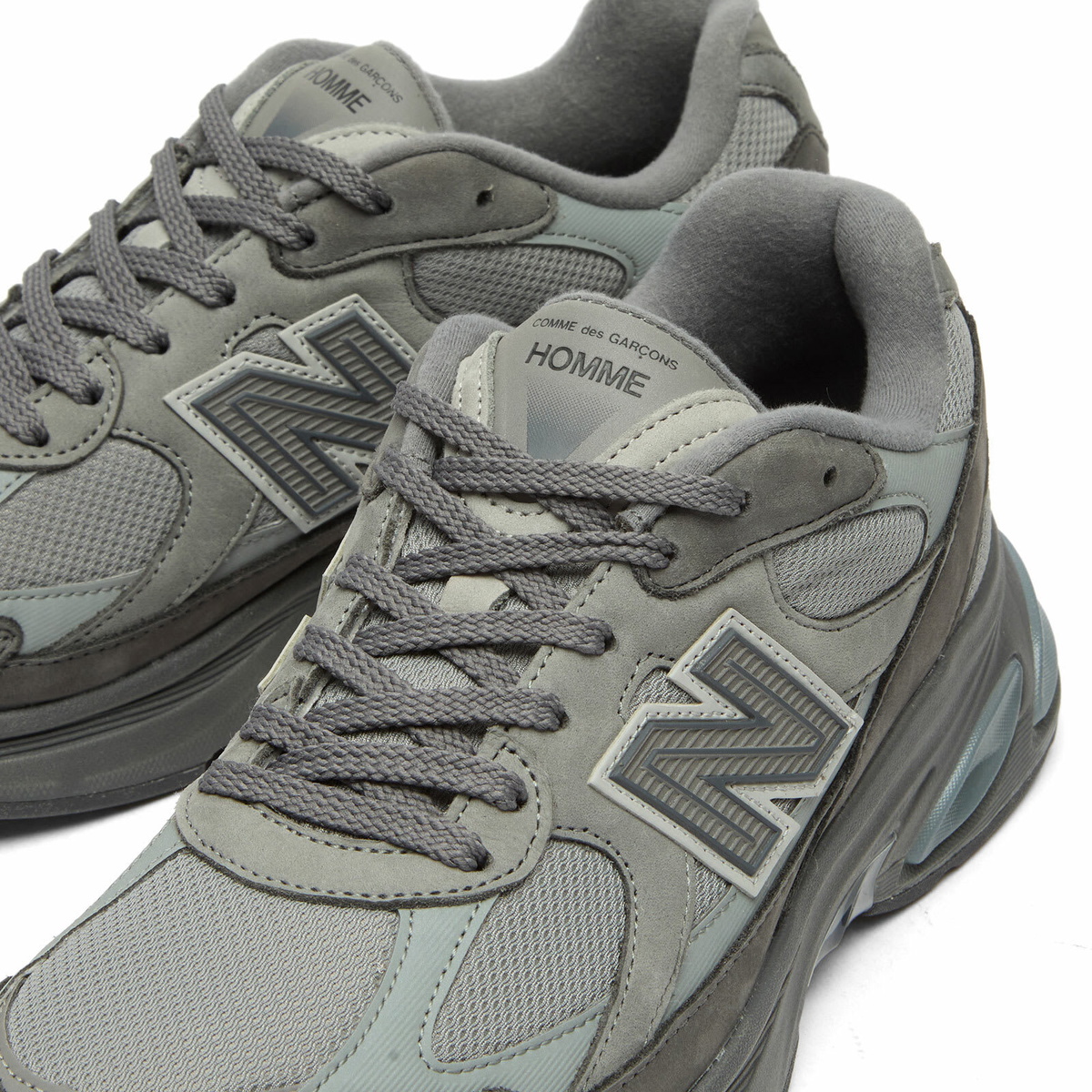 Comme des Garçons Homme Men's x New Balance 2010V Sneakers in Grey