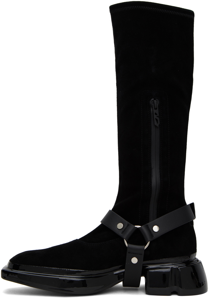 both Black Sculptural Boots