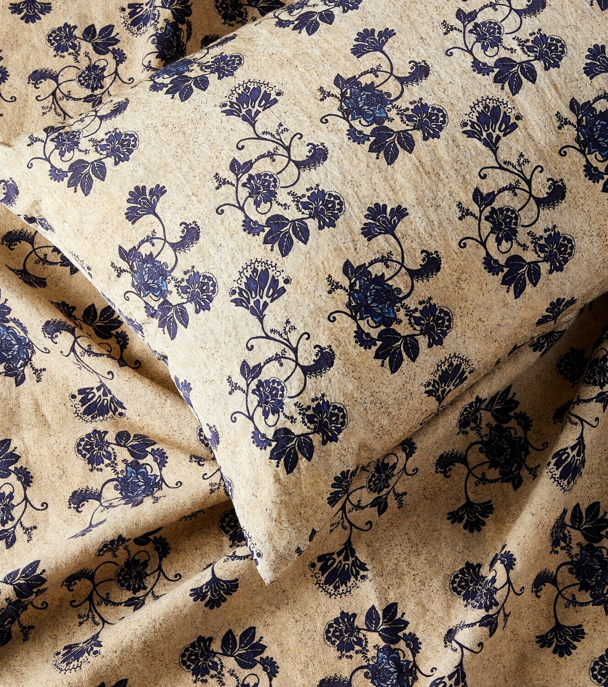 The House of Lyria Champaca floral cushion