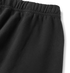 Heron Preston - Tapered Printed Loopback Cotton-Jersey Sweatpants - Black