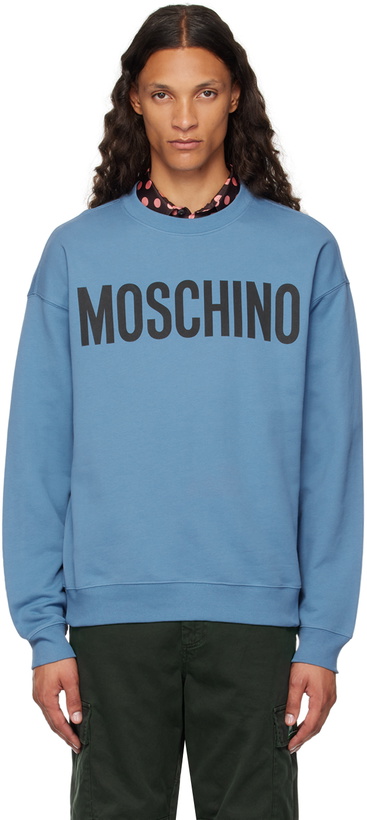 Photo: Moschino Blue Printed-Logo Sweatshirt