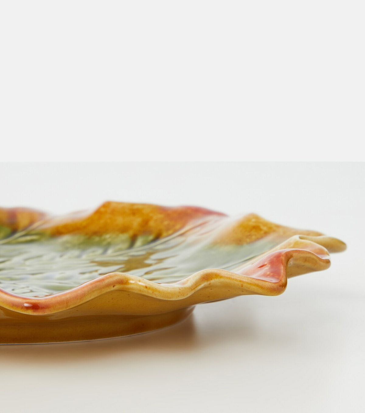 Bordallo Pinheiro Gudrun charger plate by Claudia Schiffer