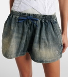 Balenciaga Distressed denim miniskirt