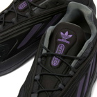 Adidas Ozelia Sneakers in Core Black/Collegiate Purple/Screaming Green