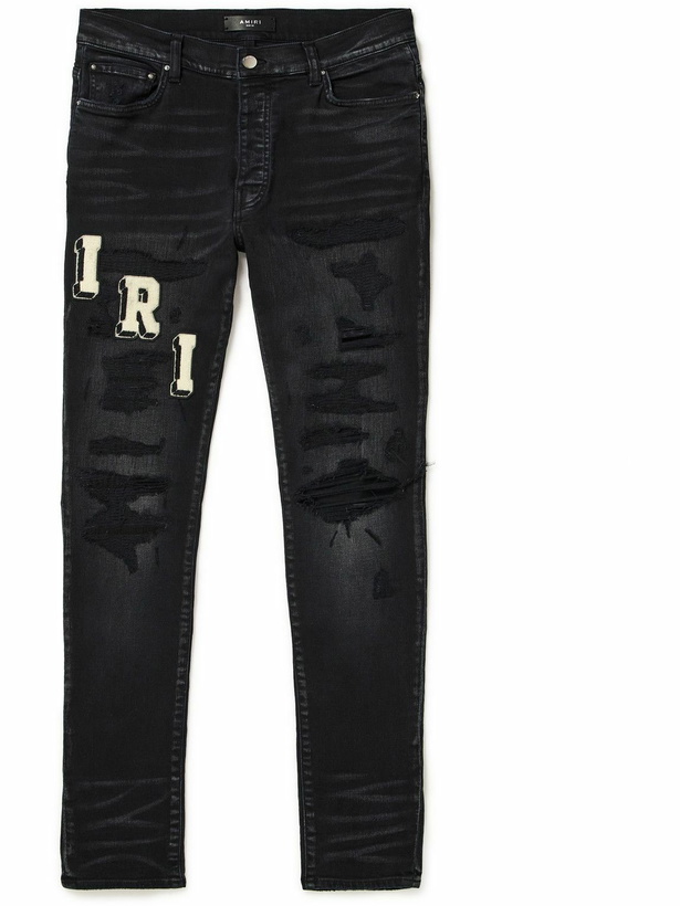 Photo: AMIRI - Skinny-Fit Logo-Appliquéd Distressed Jeans - Black