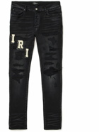 AMIRI - Skinny-Fit Logo-Appliquéd Distressed Jeans - Black