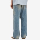 Nahmias Men's Distressed Baggy Jeans in Light Wash