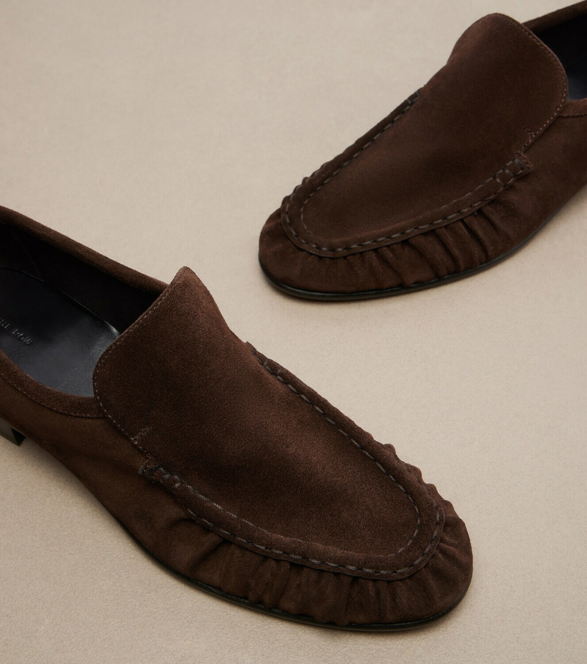 The Row Soft ruched suede loafers