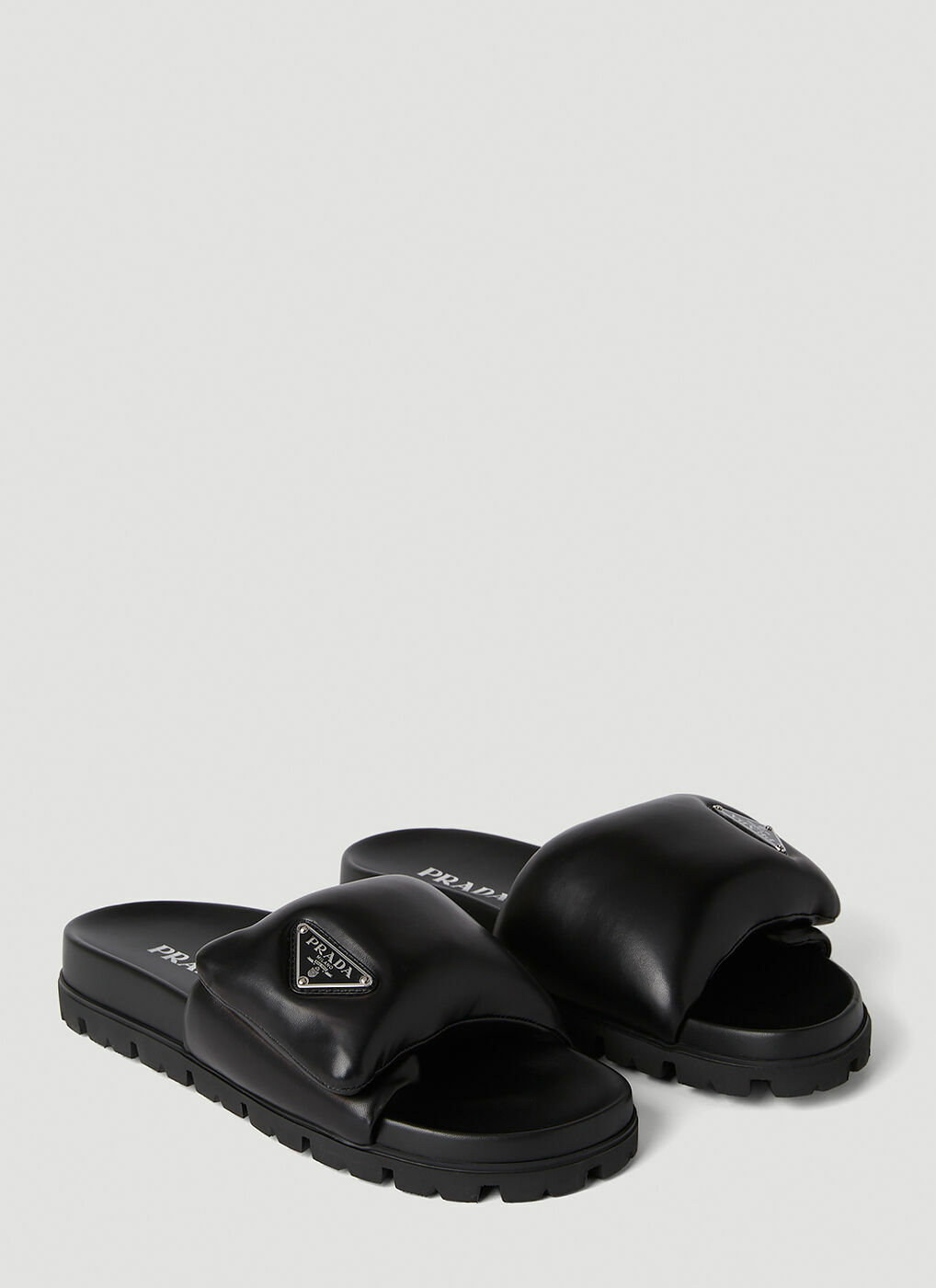 Prada Padded Logo Plaque Slides in Black Prada