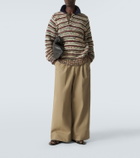 Sacai Striped cotton-blend polo sweater
