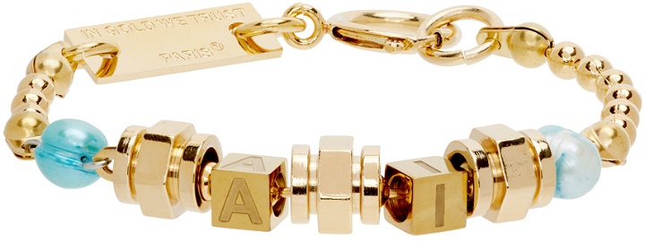 Photo: IN GOLD WE TRUST PARIS SSENSE Exclusive Gold & Blue 'AI' Bracelet