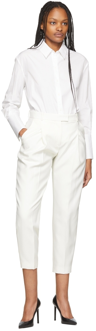 https://cdn.clothbase.com/uploads/41066475-746d-4ac1-868b-85a8711b11c0/off-white-wool-peg-trousers.jpg