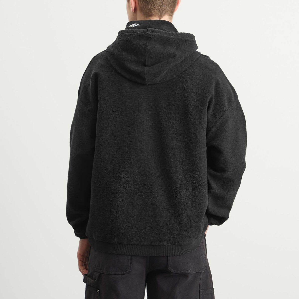 Umbro by Slam Jam Men's Lasered Masked Hoodie in Washed Black