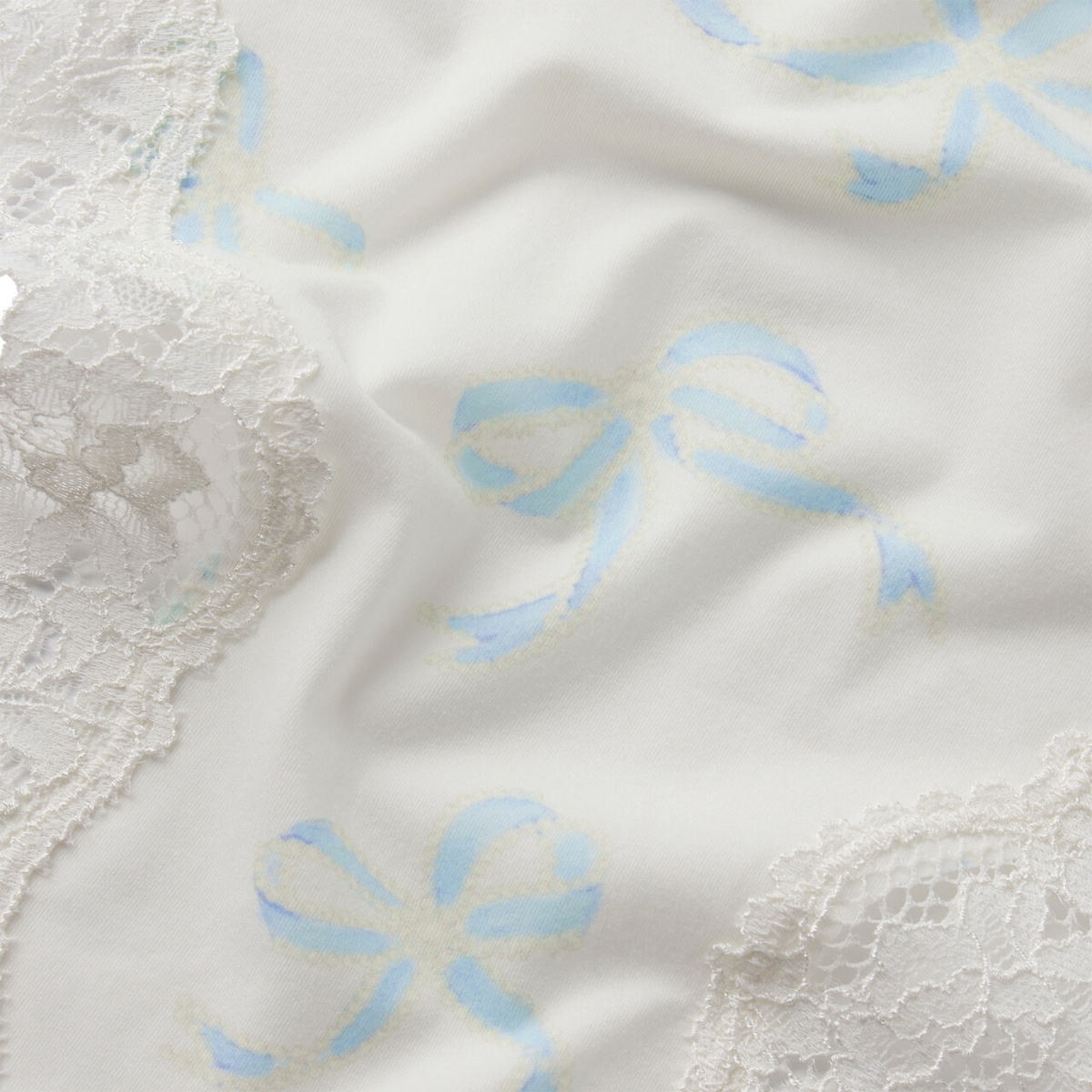 Skims Lace-trim Stretch-jersey Dipped Thong set of 5 Ivory